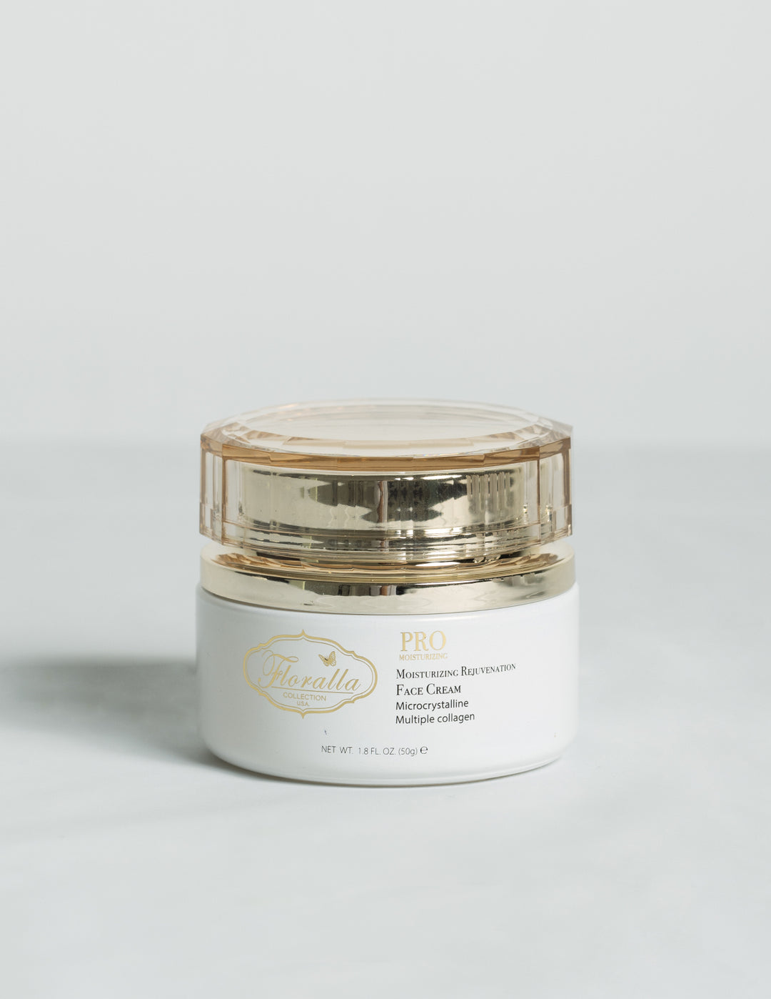 Floralla Pro Moisturizing Rejuvenating Face Cream in a gold-rimmed jar